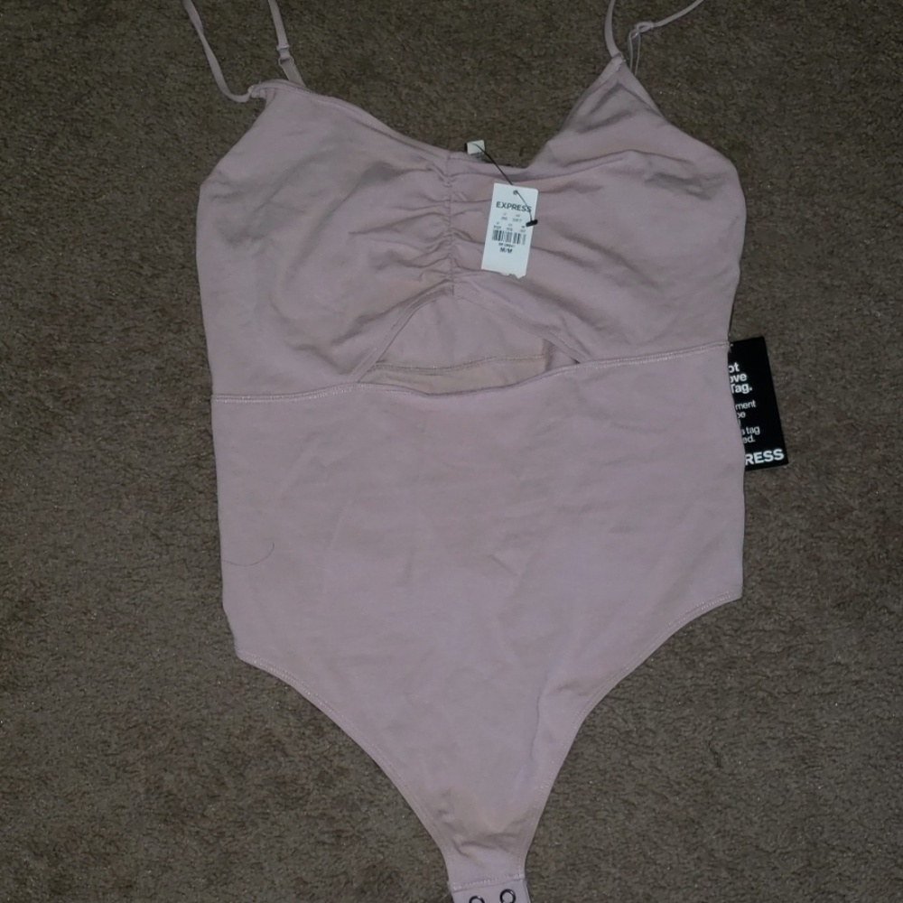BRAND NEW WITH TAGS EXPRESS CUT OUT BODY SUIT MED
